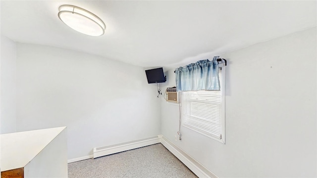 spare room with baseboards and light colored carpet