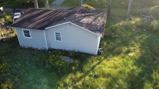 view of home's exterior featuring a chimney