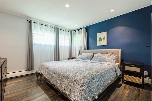 59 Springtime Ln S, Levittown, NY 11756 - bedroom featuring a baseboard heating unit, recessed lighting, and dark wood-type flooring