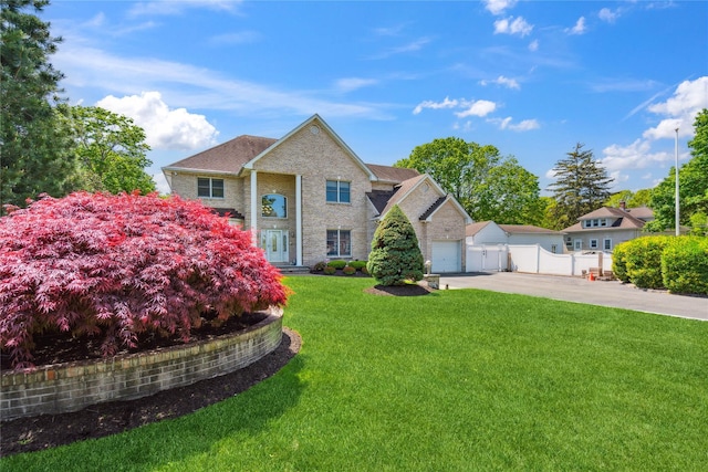 4 Millennium Ct, Bohemia, NY 11716 - view of front of property featuring a garage, brick siding, and concrete driveway