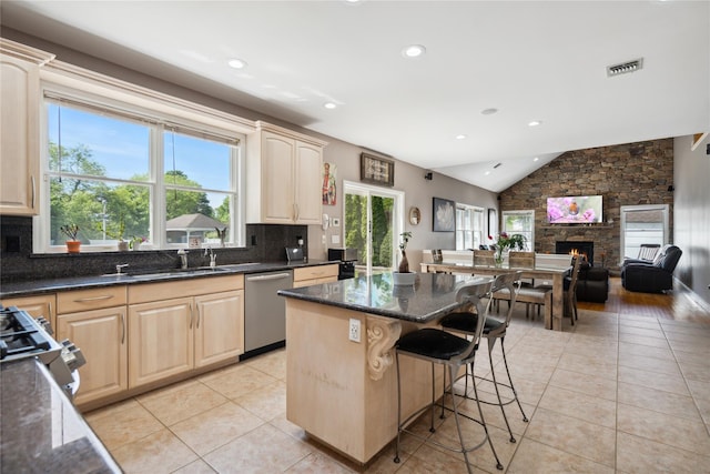 4 Millennium Ct, Bohemia, NY 11716 - kitchen with stainless steel appliances, light brown cabinets, light tile patterned flooring, lofted ceiling, and recessed lighting