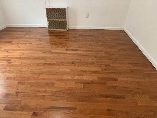 333 Lehrer Ave, Elmont, NY 11003 - unfurnished room featuring wood finished floors and baseboards