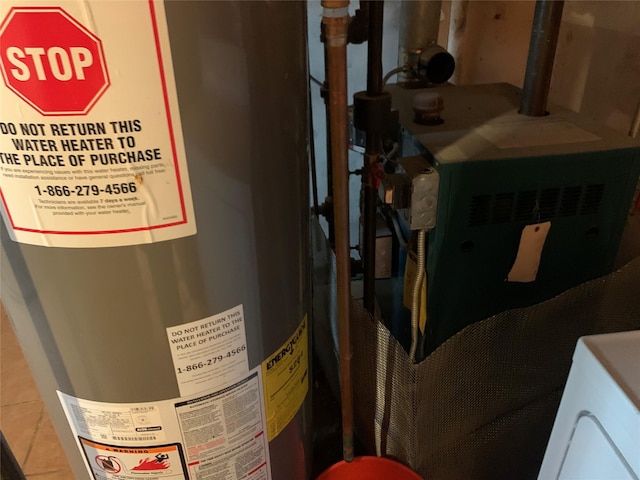 333 Lehrer Ave, Elmont, NY 11003 - utility room featuring water heater