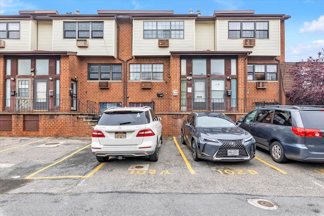 2-20 Capstan Ct Unit 102B, College Point, NY 11356 - view of property featuring uncovered parking