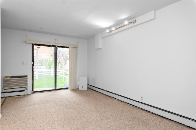 2-20 Capstan Ct Unit 102B, College Point, NY 11356 - carpeted spare room featuring baseboard heating and a wall mounted AC