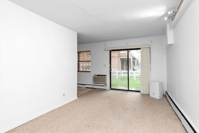 2-20 Capstan Ct Unit 102B, College Point, NY 11356 - spare room featuring a baseboard heating unit and baseboard heating