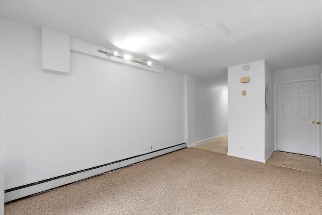 2-20 Capstan Ct Unit 102B, College Point, NY 11356 - finished below grade area with baseboard heating, light colored carpet, and baseboards