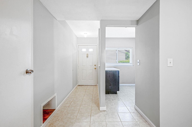 163 Pointe Cir N Unit 163, Coram, NY 11727 - corridor with baseboards and light tile patterned flooring