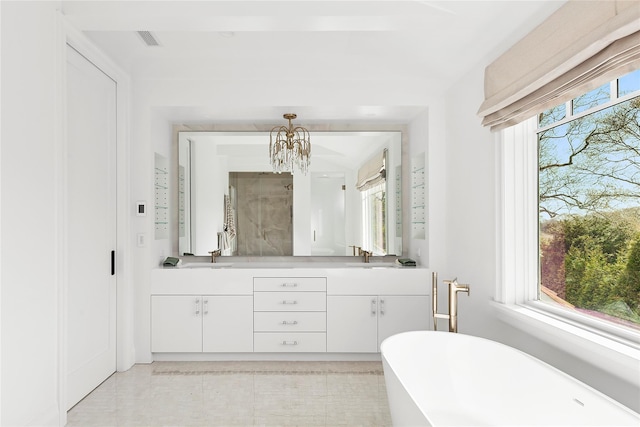171 Oneck Ln, Westhampton Beach, NY 11978 - full bathroom with double vanity, an inviting chandelier, a sink, a soaking tub, and visible vents