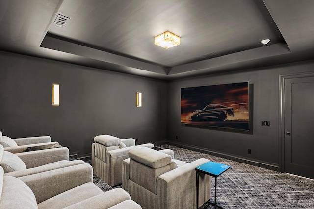 171 Oneck Ln, Westhampton Beach, NY 11978 - home theater featuring baseboards, a raised ceiling, visible vents, and carpet