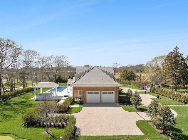 171 Oneck Ln, Westhampton Beach, NY 11978 - exterior space with a front lawn, driveway, and an attached garage