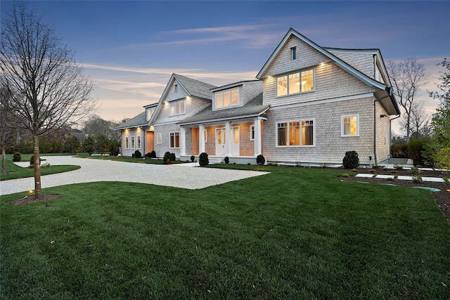 171 Oneck Ln, Westhampton Beach, NY 11978 - view of front of home featuring a yard, a shingled roof, and covered porch