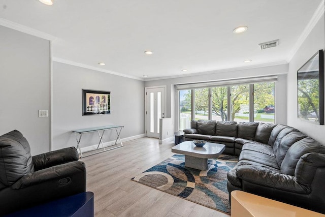 214 Central Park Rd, Plainview, NY 11803 - living area featuring wood finished floors, recessed lighting, baseboards, and crown molding