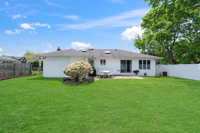 214 Central Park Rd, Plainview, NY 11803 - back of house with a patio and a chimney