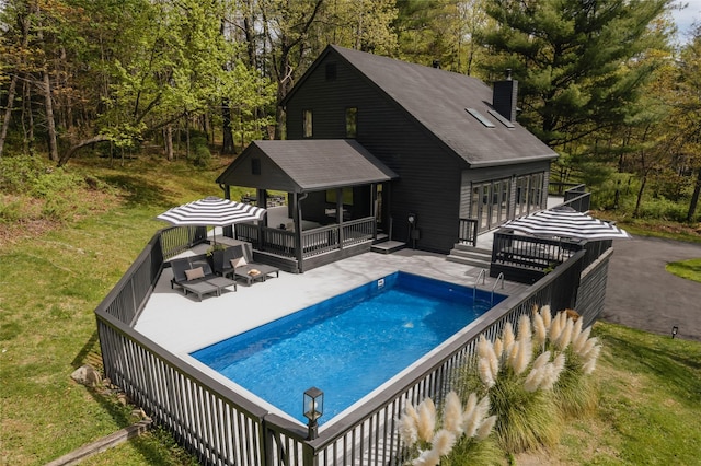 825 County Route 6, High Falls, NY 12440 - view of pool with a wooden deck, an outdoor hangout area, a yard, and a patio area