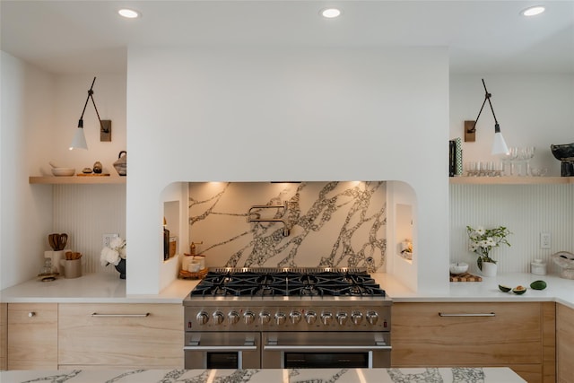 825 County Route 6, High Falls, NY 12440 - kitchen with double oven range, modern cabinets, light brown cabinetry, recessed lighting, and light countertops