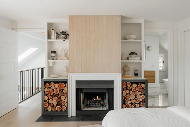 825 County Route 6, High Falls, NY 12440 - bedroom with a fireplace with flush hearth