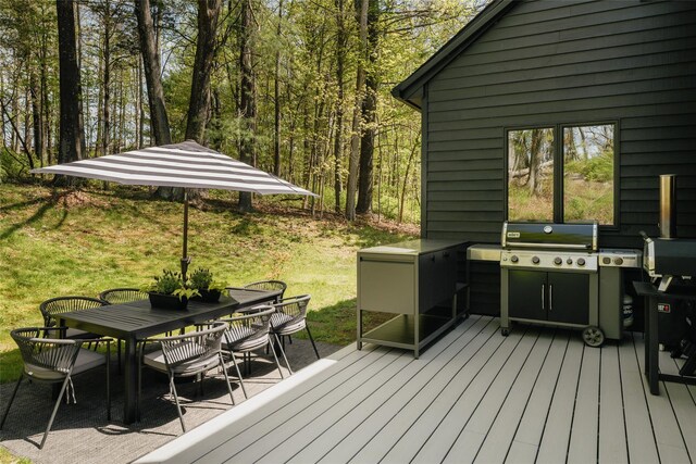825 County Route 6, High Falls, NY 12440 - wooden deck featuring outdoor dining space and a yard