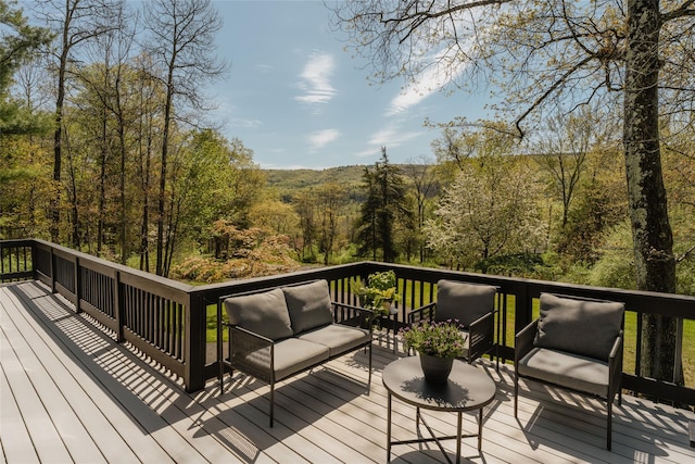 825 County Route 6, High Falls, NY 12440 - wooden deck with an outdoor hangout area and a view of trees