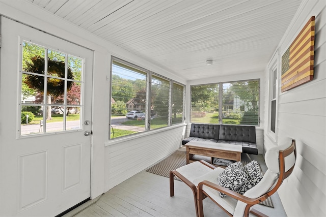 sunroom with plenty of natural light