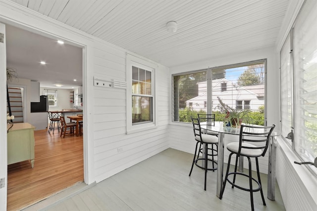 sunroom featuring plenty of natural light