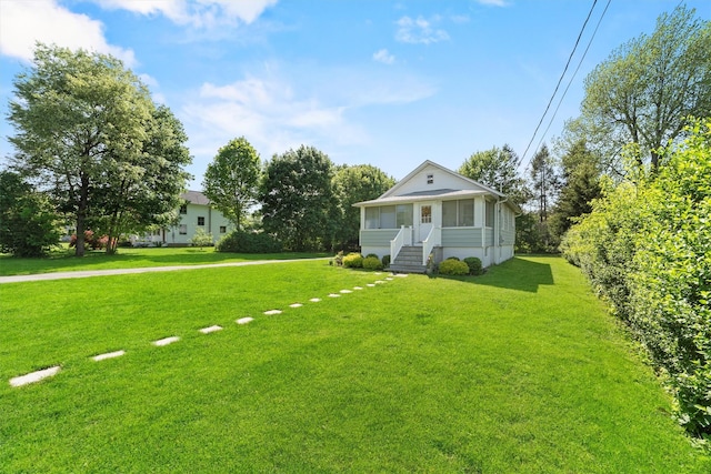 view of front of home featuring a front lawn