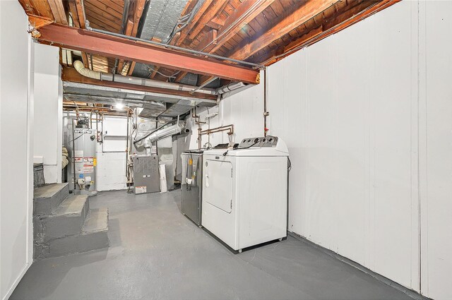 22 Chauncey St, Tuckahoe, NY 10707 - unfinished basement featuring water heater, washer and dryer, and heating unit
