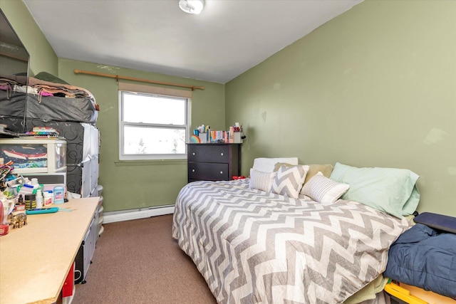 carpeted bedroom featuring a baseboard heating unit