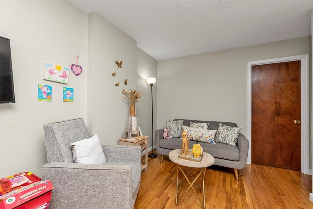 sitting room featuring light wood-style flooring