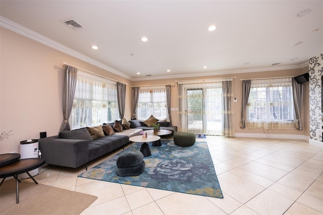 living room featuring light tile patterned floors, ornamental molding, recessed lighting, and baseboards