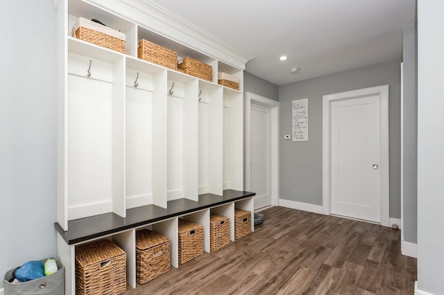 mudroom featuring recessed lighting, baseboards, and wood finished floors