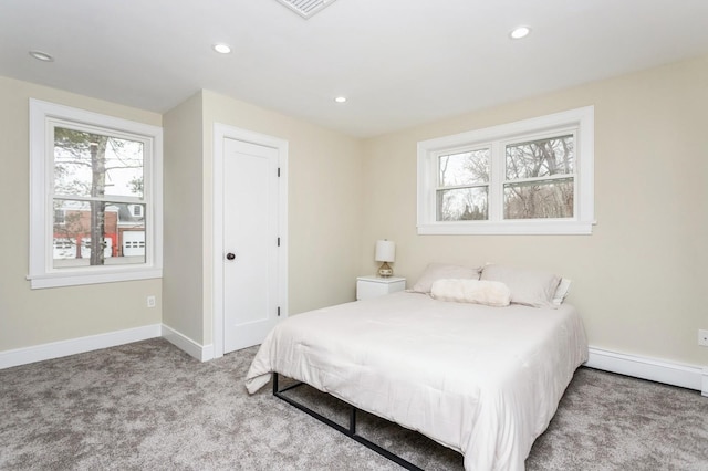 bedroom featuring recessed lighting, carpet floors, baseboards, and multiple windows