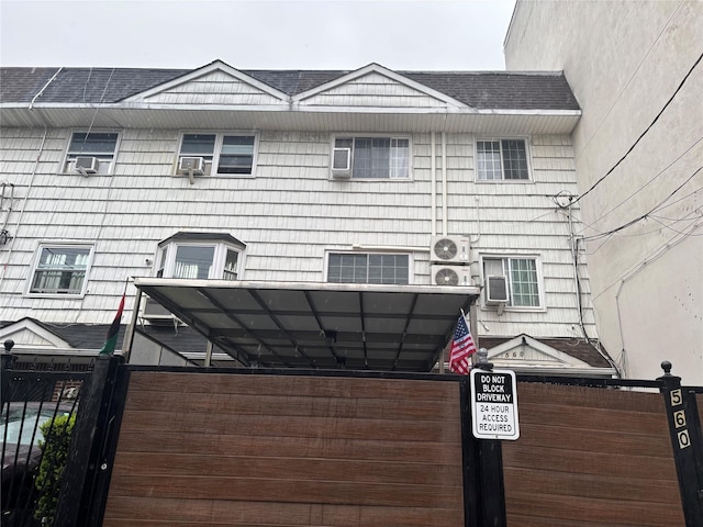 exterior details with cooling unit and fence