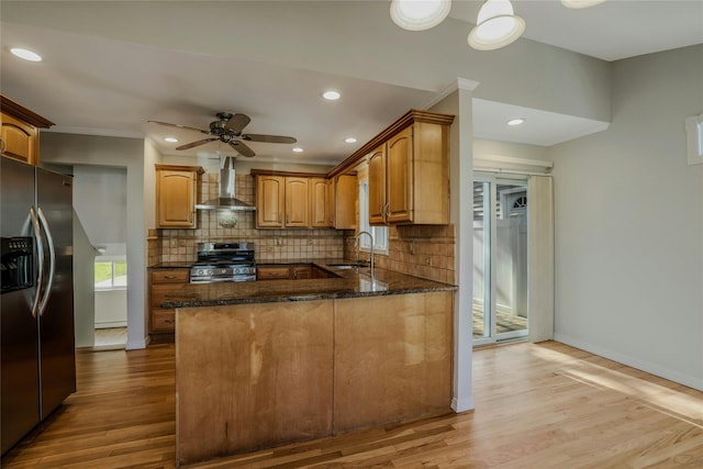 311 Atlantic, Massapequa Park, NY 11762 - kitchen featuring stainless steel appliances, wall chimney exhaust hood, a peninsula, decorative backsplash, and recessed lighting