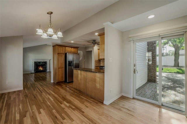 311 Atlantic, Massapequa Park, NY 11762 - kitchen featuring stainless steel refrigerator with ice dispenser, wood finished floors, brown cabinetry, baseboards, and recessed lighting