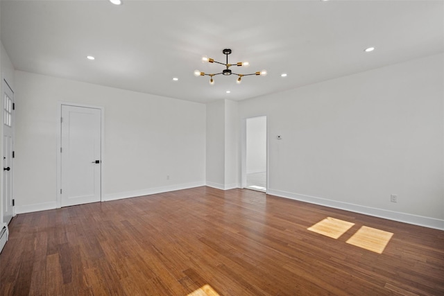 247 Osborne Hill Rd, Fishkill, NY 12524 - spare room with baseboards, a notable chandelier, recessed lighting, and wood finished floors