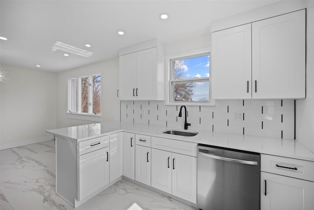 247 Osborne Hill Rd, Fishkill, NY 12524 - kitchen with a sink, stainless steel dishwasher, a peninsula, and marble finish floor