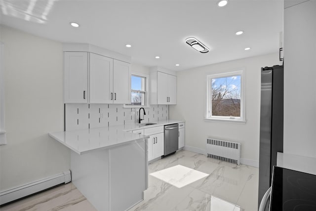 247 Osborne Hill Rd, Fishkill, NY 12524 - kitchen featuring a baseboard radiator, recessed lighting, radiator heating unit, a sink, and stainless steel appliances