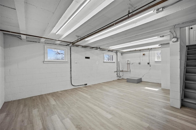 247 Osborne Hill Rd, Fishkill, NY 12524 - below grade area featuring stairway, a healthy amount of sunlight, and wood finished floors