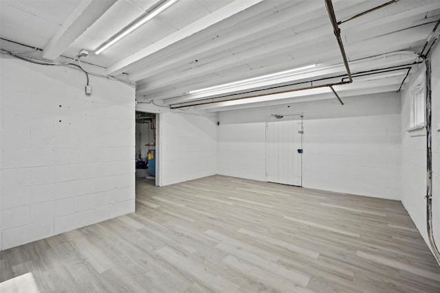 247 Osborne Hill Rd, Fishkill, NY 12524 - unfinished basement with concrete block wall and light wood-style flooring