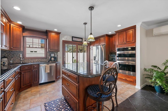 340 Martin Pl, Bethpage, NY 11714 - kitchen featuring appliances with stainless steel finishes, a kitchen bar, backsplash, a center island, and a sink