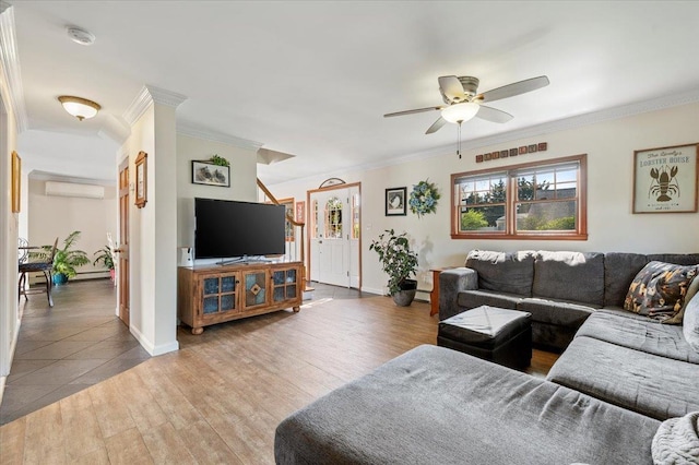 340 Martin Pl, Bethpage, NY 11714 - living room featuring crown molding, wood finished floors, a ceiling fan, a wall mounted air conditioner, and baseboards