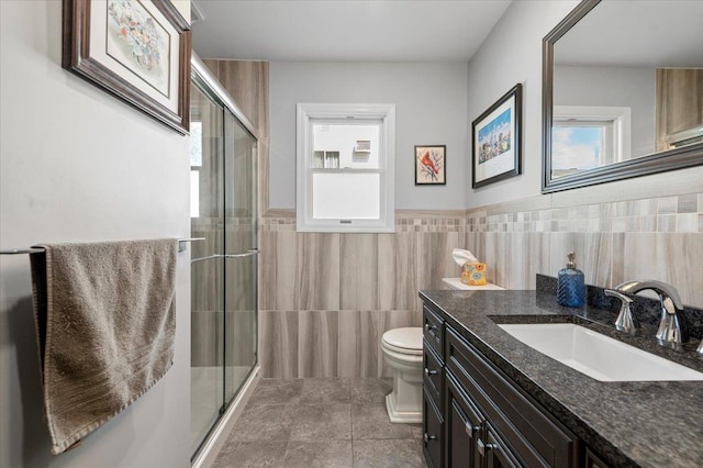 340 Martin Pl, Bethpage, NY 11714 - full bath featuring tile walls, tile patterned floors, a shower stall, toilet, and vanity