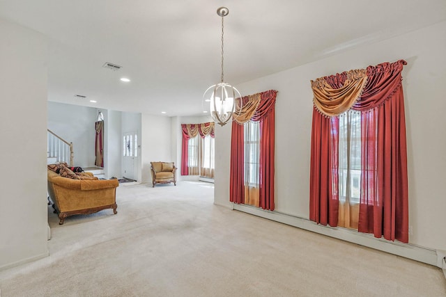 sitting room featuring a baseboard heating unit, stairway, carpet flooring, a chandelier, and recessed lighting
