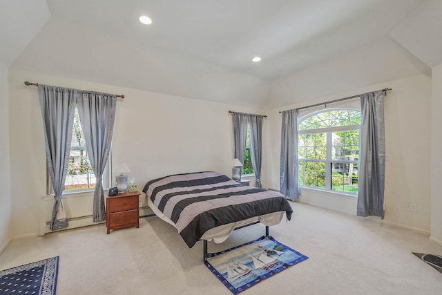 bedroom with carpet, lofted ceiling, recessed lighting, a baseboard radiator, and baseboards