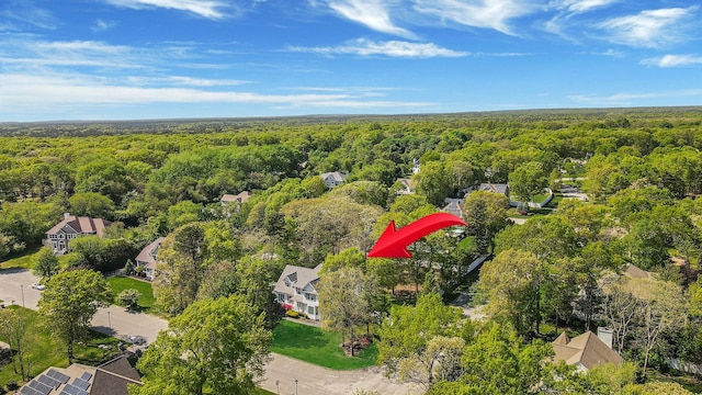 aerial overview of property's location featuring a forest