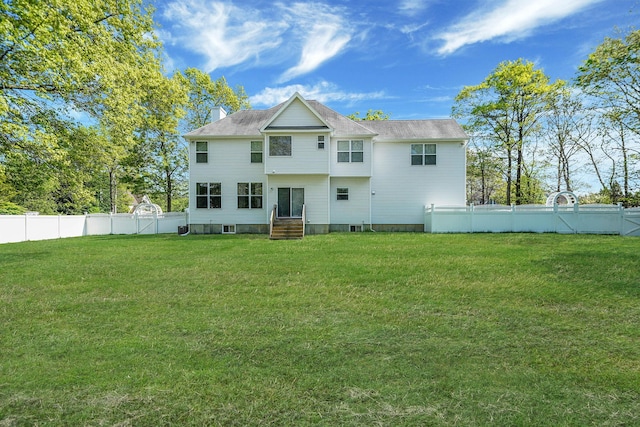 rear view of property with entry steps and a chimney