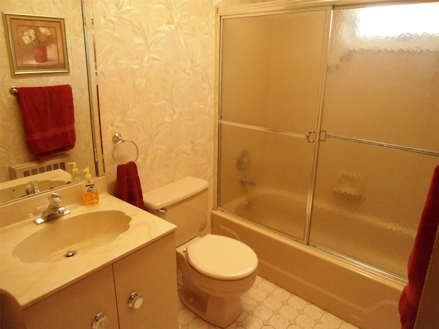 212 Wensley Ln, East Islip, NY 11730 - full bathroom featuring toilet, combined bath / shower with glass door, vanity, and tile patterned floors
