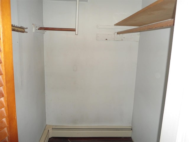 212 Wensley Ln, East Islip, NY 11730 - spacious closet with a baseboard radiator