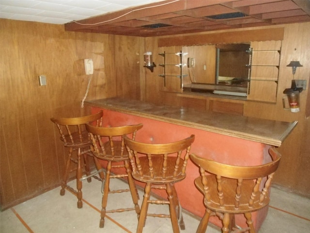 212 Wensley Ln, East Islip, NY 11730 - indoor dry bar featuring wooden walls